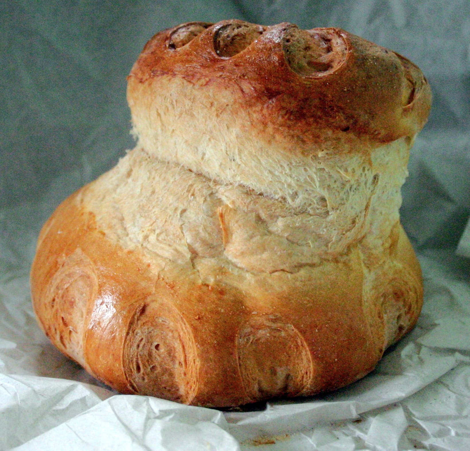 Cottage loaf — a british main course dish from United Kingdom — featuring stacked round loaves, traditional English, time-consuming to make
