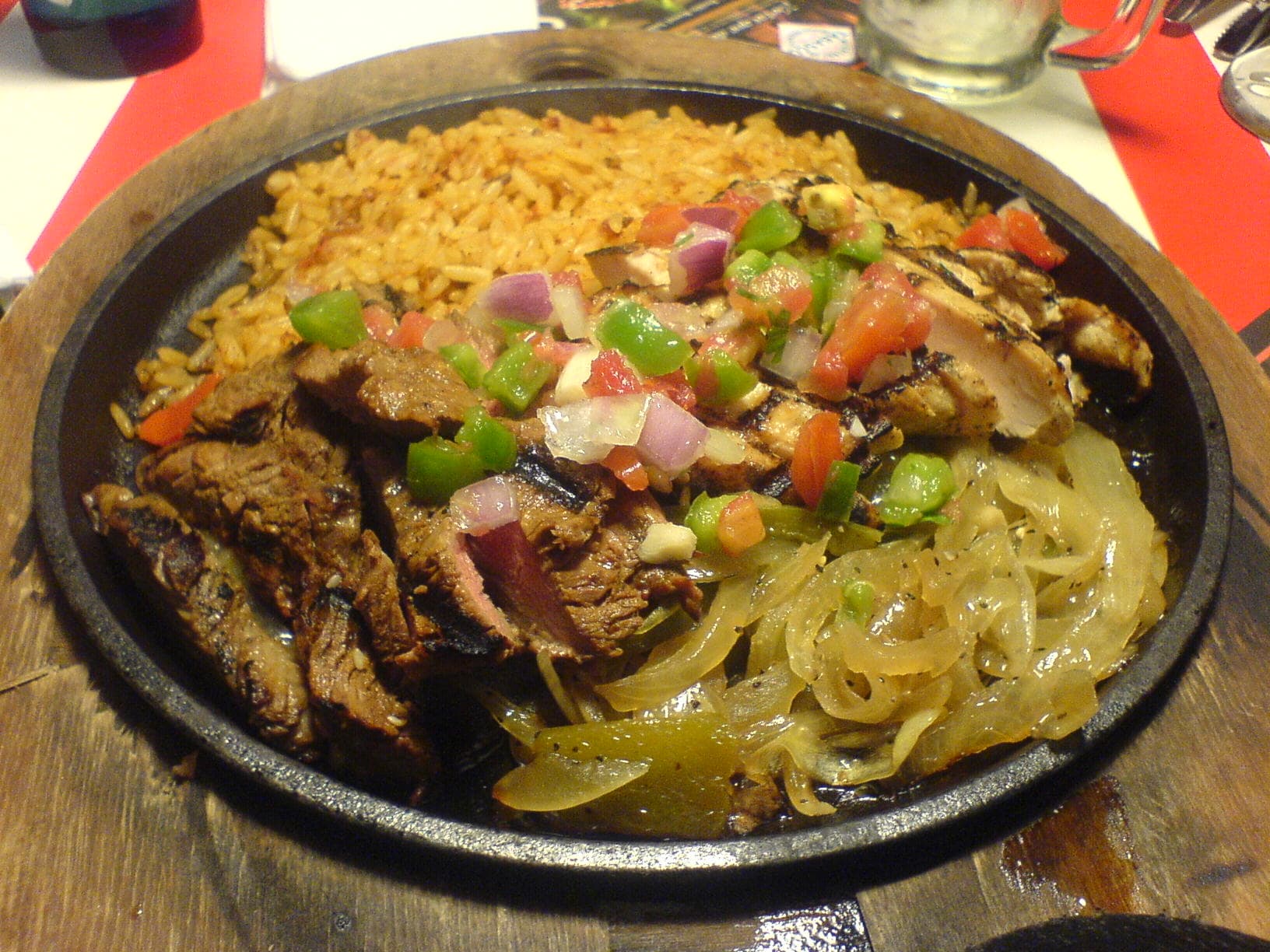 Fajita — a mexican main course dish from Mexico — featuring grilled and sautéed, customizable, handheld