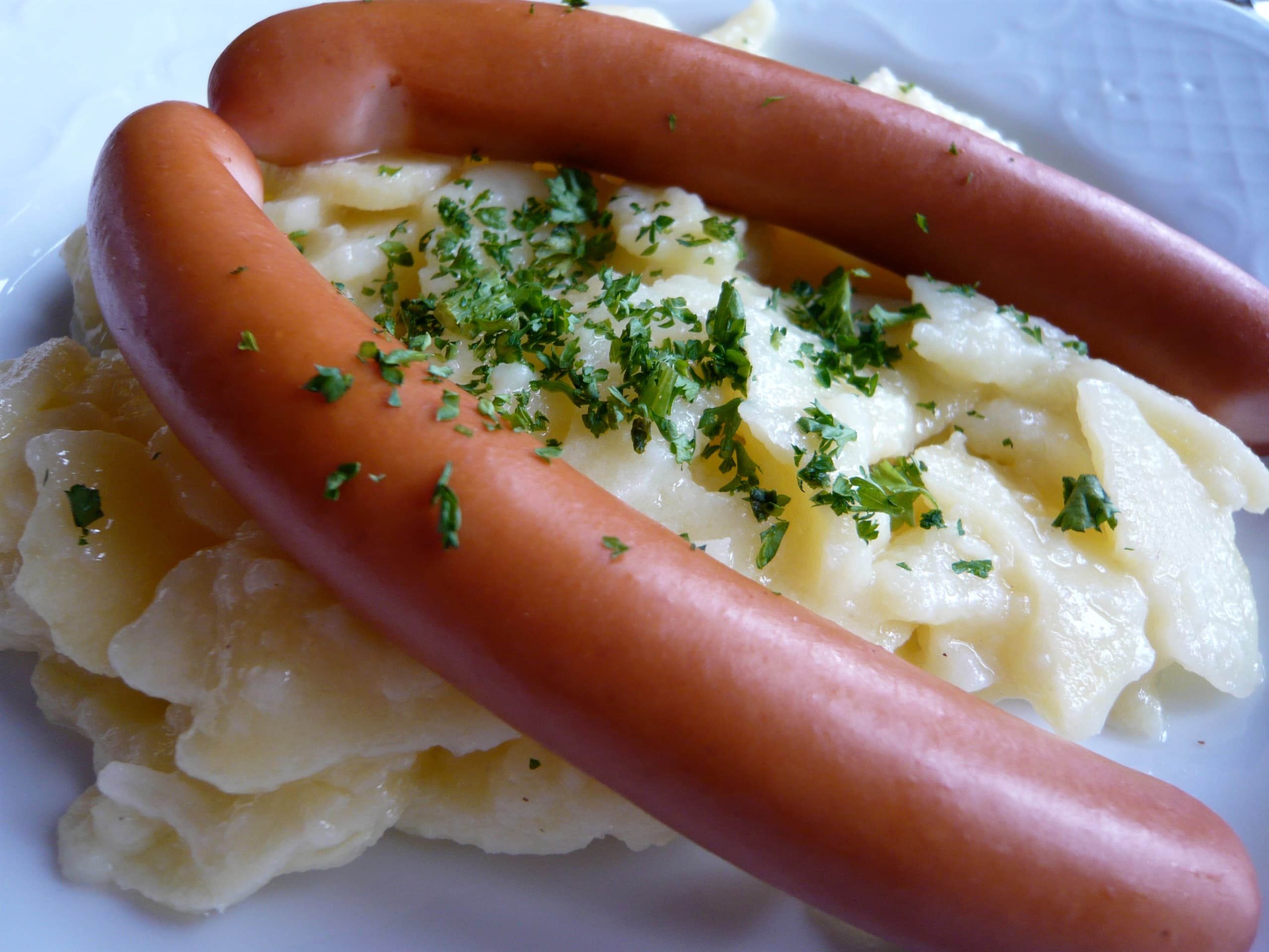 Frankfurter Würstchen — a german main course dish from Germany — featuring parboiled, sheep's intestine casing, low-temperature smoked