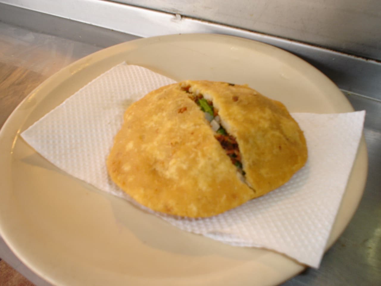 Gordita — a mexican main course dish from Mexico — featuring masa-based, hand-held, fried or baked