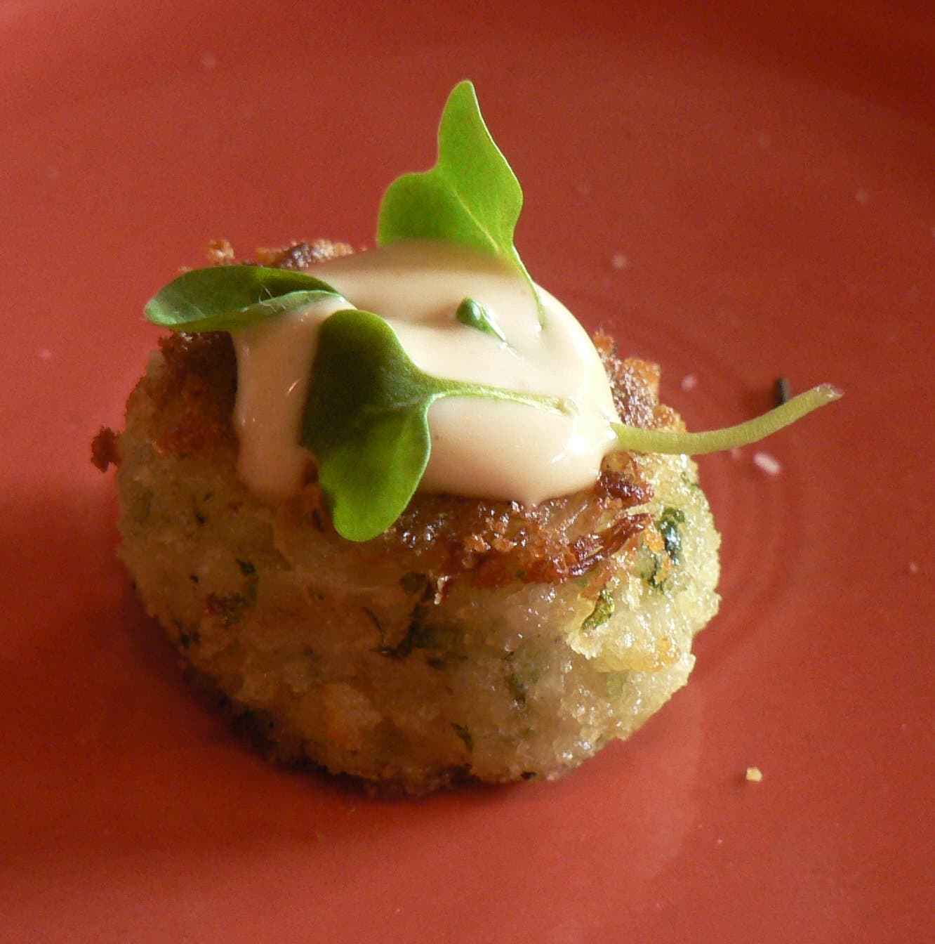 Crab cake — a american main course dish from United States — featuring bound fishcake, sautéed or fried, regional crustacean