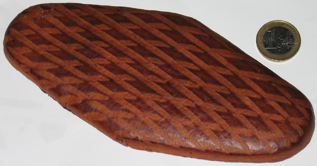 Haddekuche — a german main course dish from Germany — featuring diamond-patterned, hard and brittle, Hessian street food