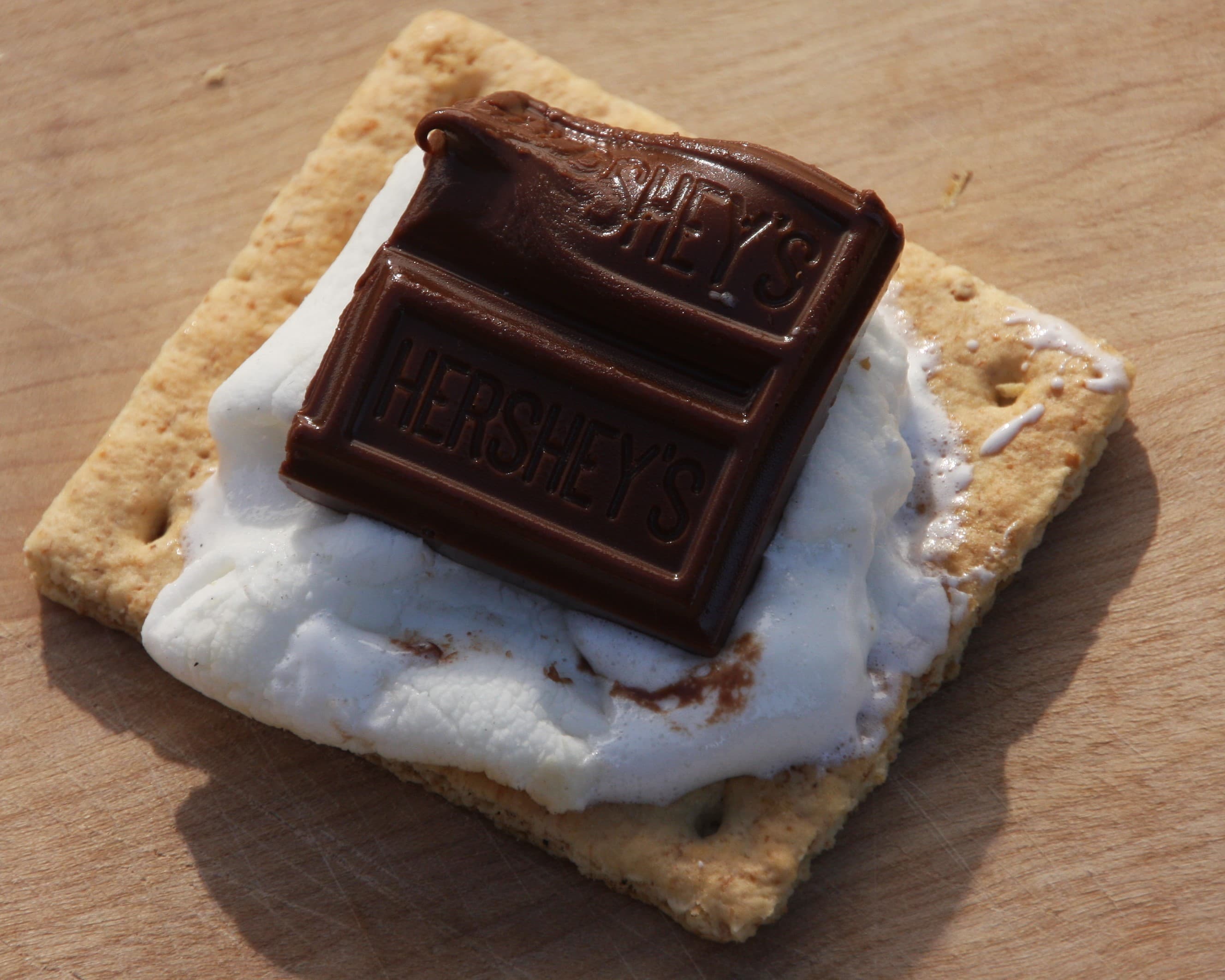 S'more — a american main course dish from United States — featuring toasted, melted-together, campfire-born