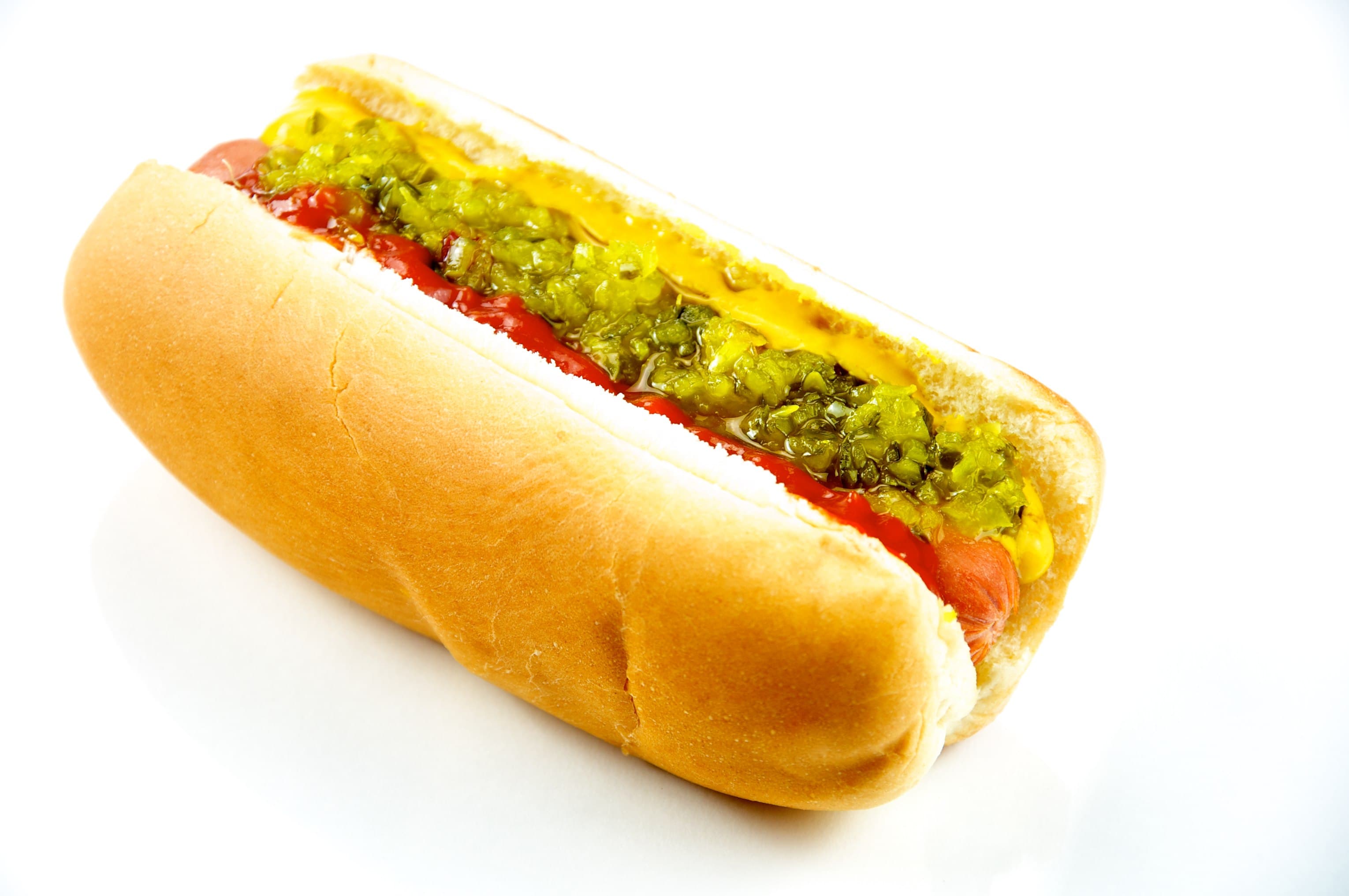Hot dog — a american street food dish from United States — featuring grilled or steamed, condiment-forward, working-class street food