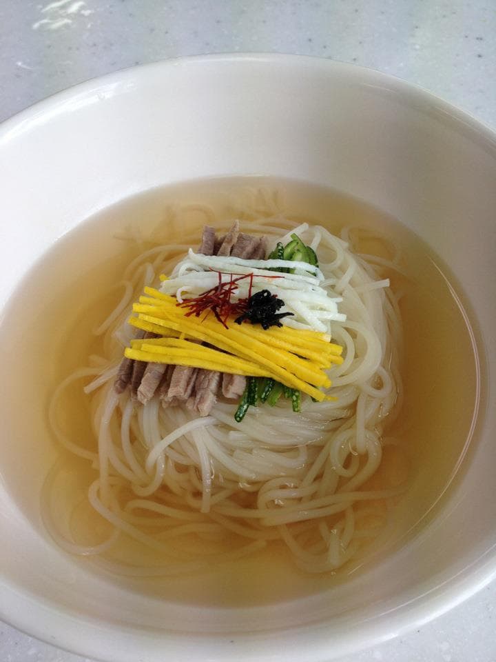 Janchi-guksu — a korea cuisine main course dish from Korea — featuring delicate wheat noodles, anchovy-kelp broth, sesame oil finish