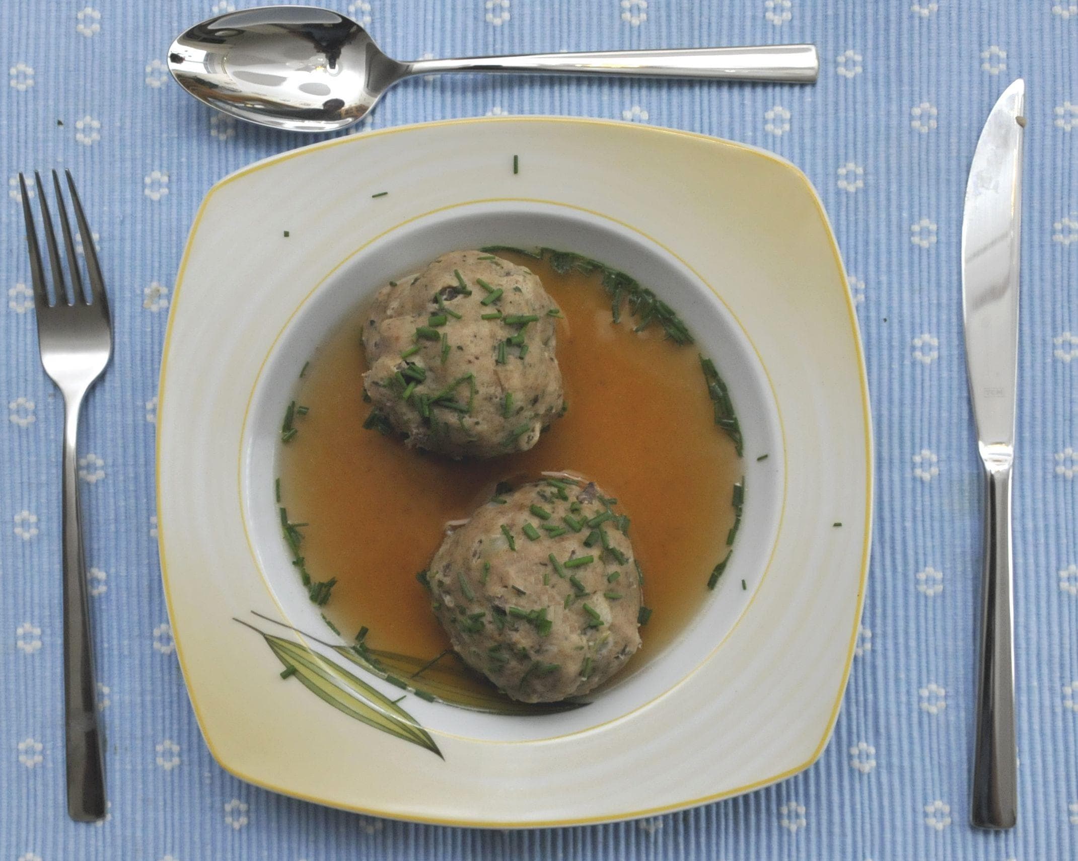 Leberknödel — a german main course dish from Germany — featuring spoon-formed dumpling, beef liver base, boiled or fried