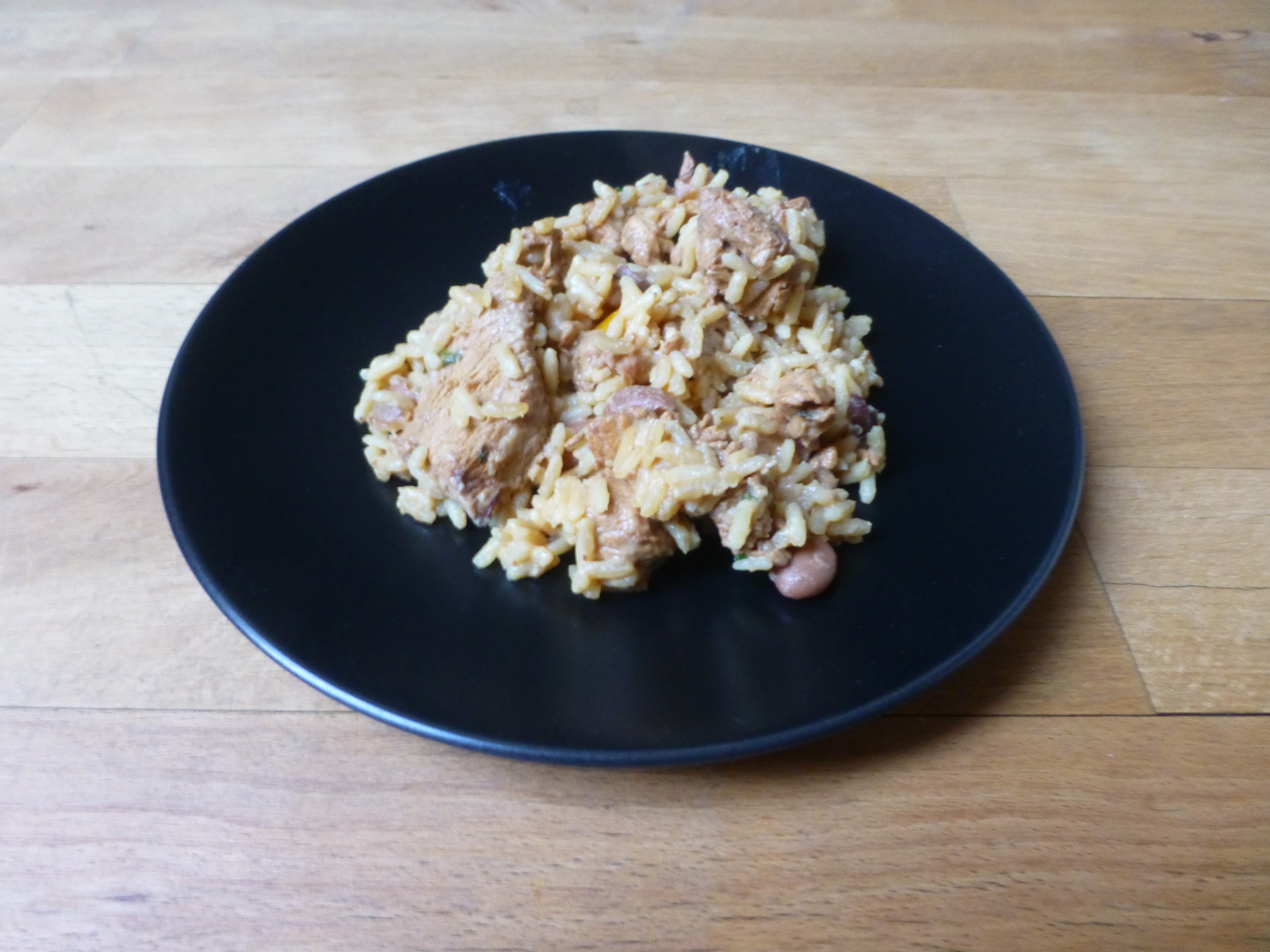 Pelau — a trinidad and tobago cuisine main course dish from Trinidad and Tobago — featuring caramelized meat, one-pot rice, spiced legumes