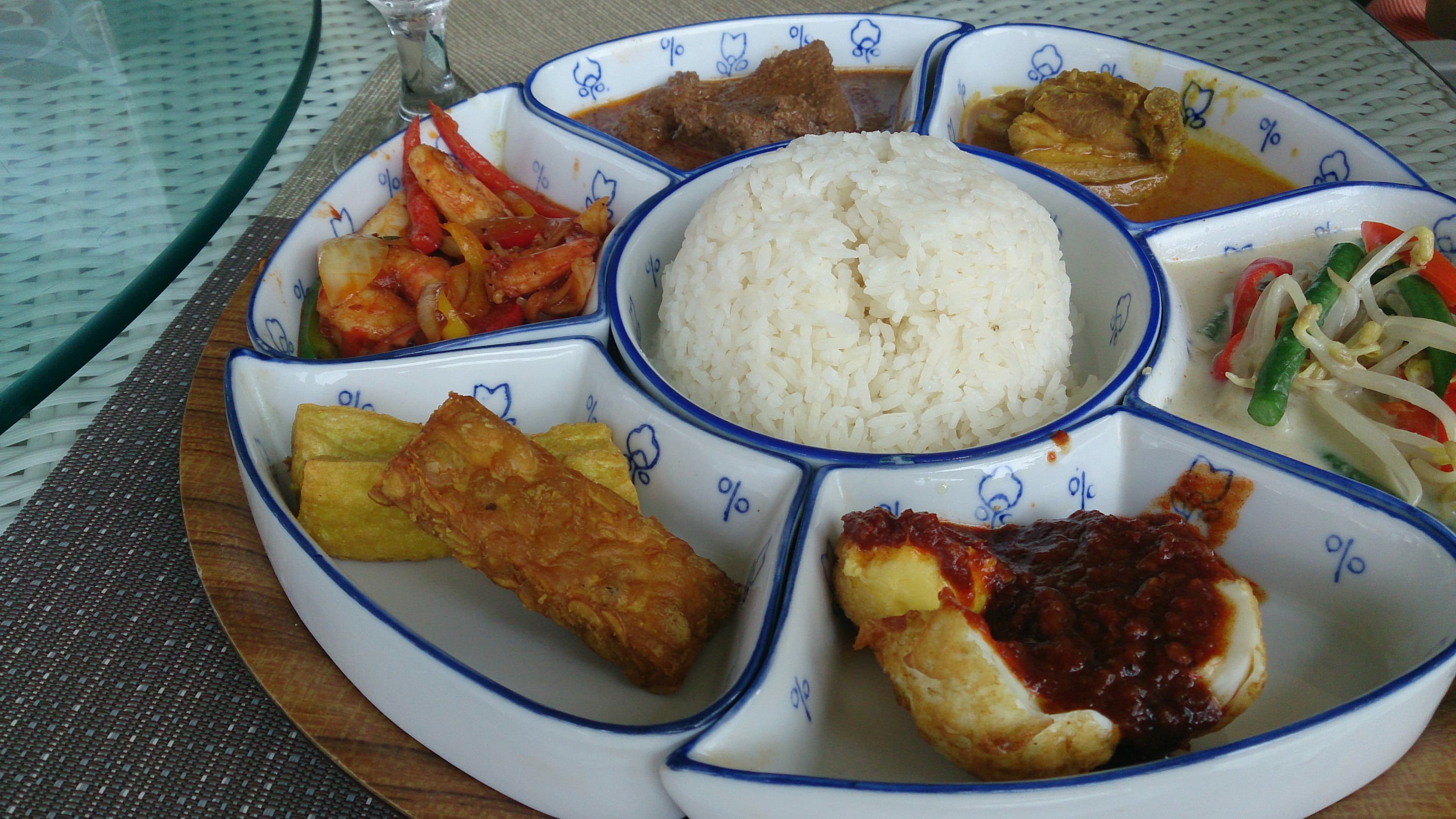 Nasi padang — a indonesian main course dish from Indonesia — featuring pre-cooked components, rice-centered, Minangkabau