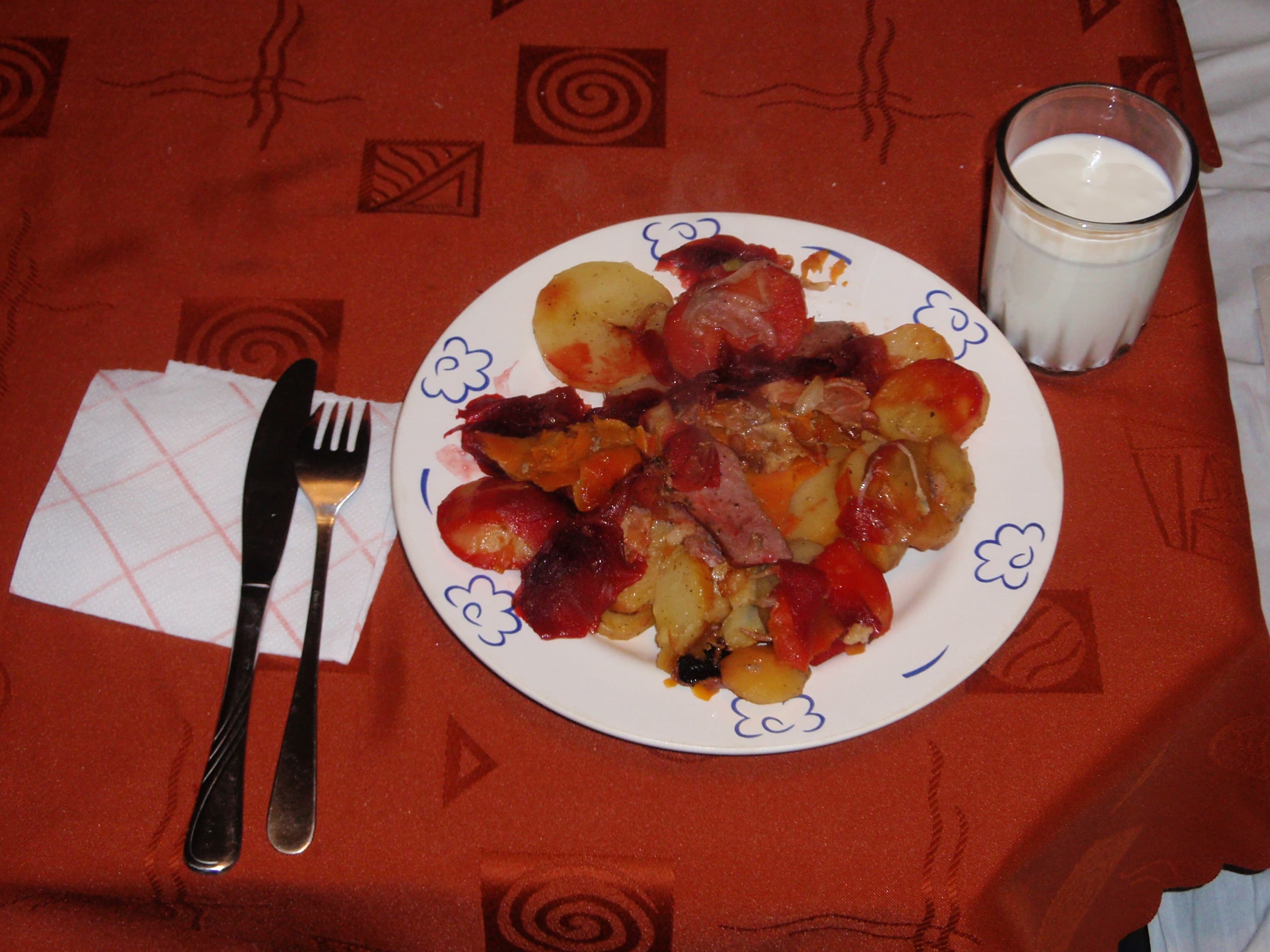Prażonki — a polish main course dish from Poland — featuring braised in cast iron, cabbage-wrapped, lard-enriched