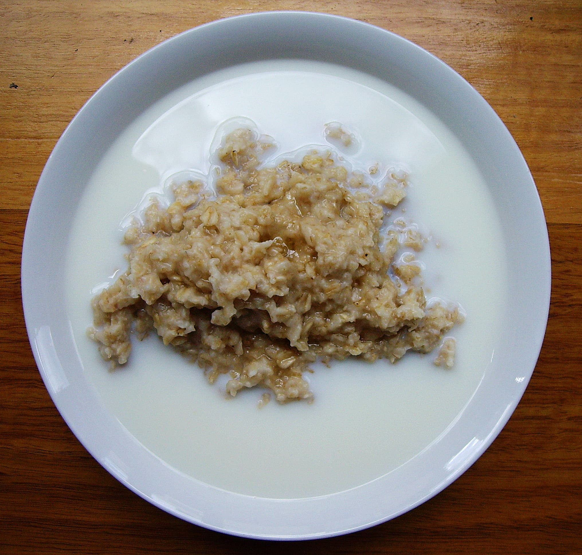 Porridge — a europe cuisine main course dish from Europe — featuring slow-cooked grain, globally adaptable, served hot