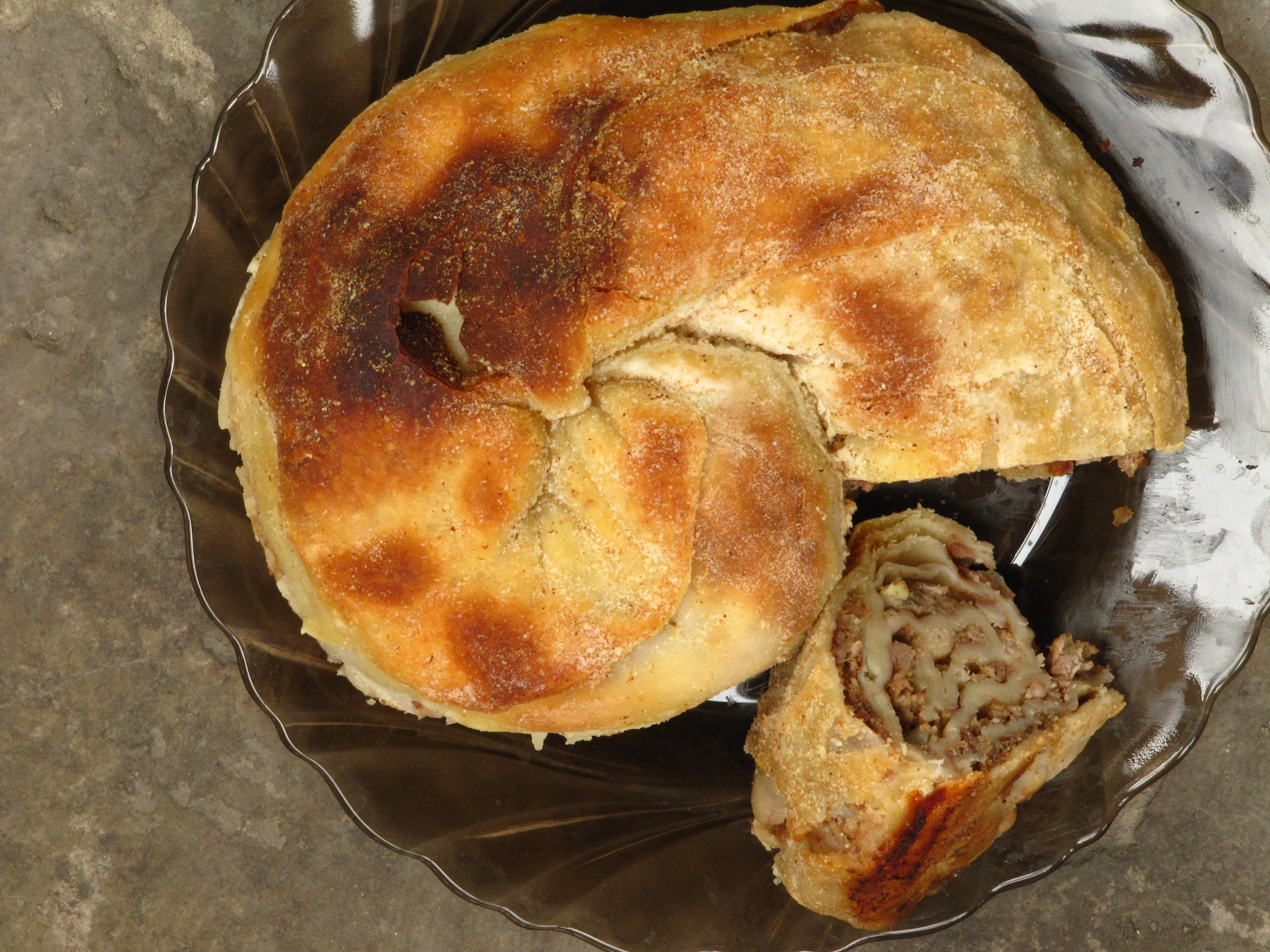 Sarburma — a turkish snack dish from Turkey — featuring spiral-wrapped, lamb-filled, Crimean Tatar