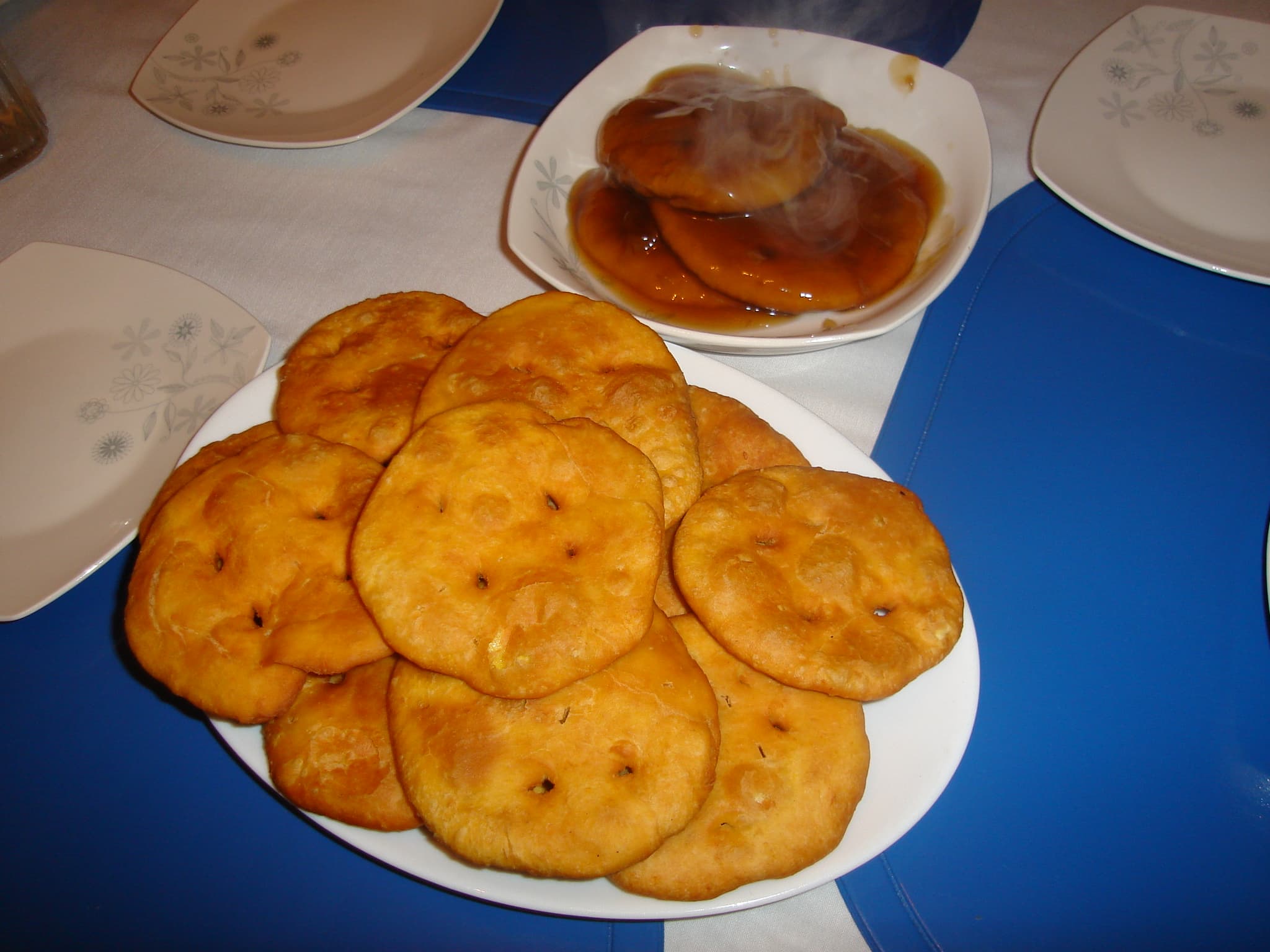 Chancaca — a bolivian main course dish from Bolivia — featuring unrefined sugar base, warm spiced syrup, orange & cinnamon