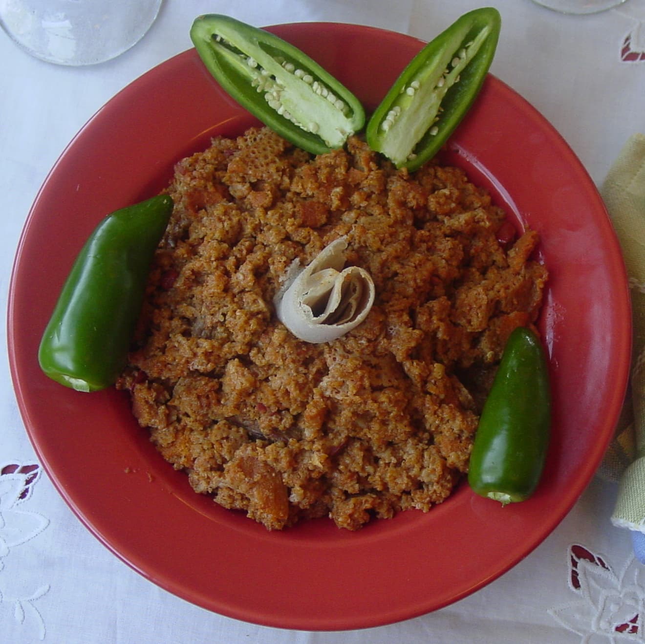 Fit-fit — a ethiopian breakfast dish from Ethiopia — featuring shredded & tossed, butter-soaked, spice-forward