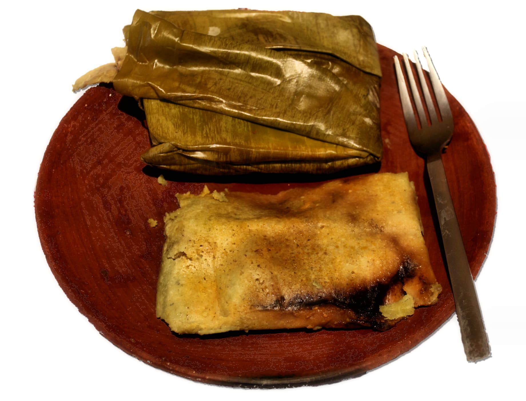 Tamale — a mesoamerica cuisine main course dish from Mesoamerica — featuring nixtamalized corn dough, steamed in husks, customizable fillings