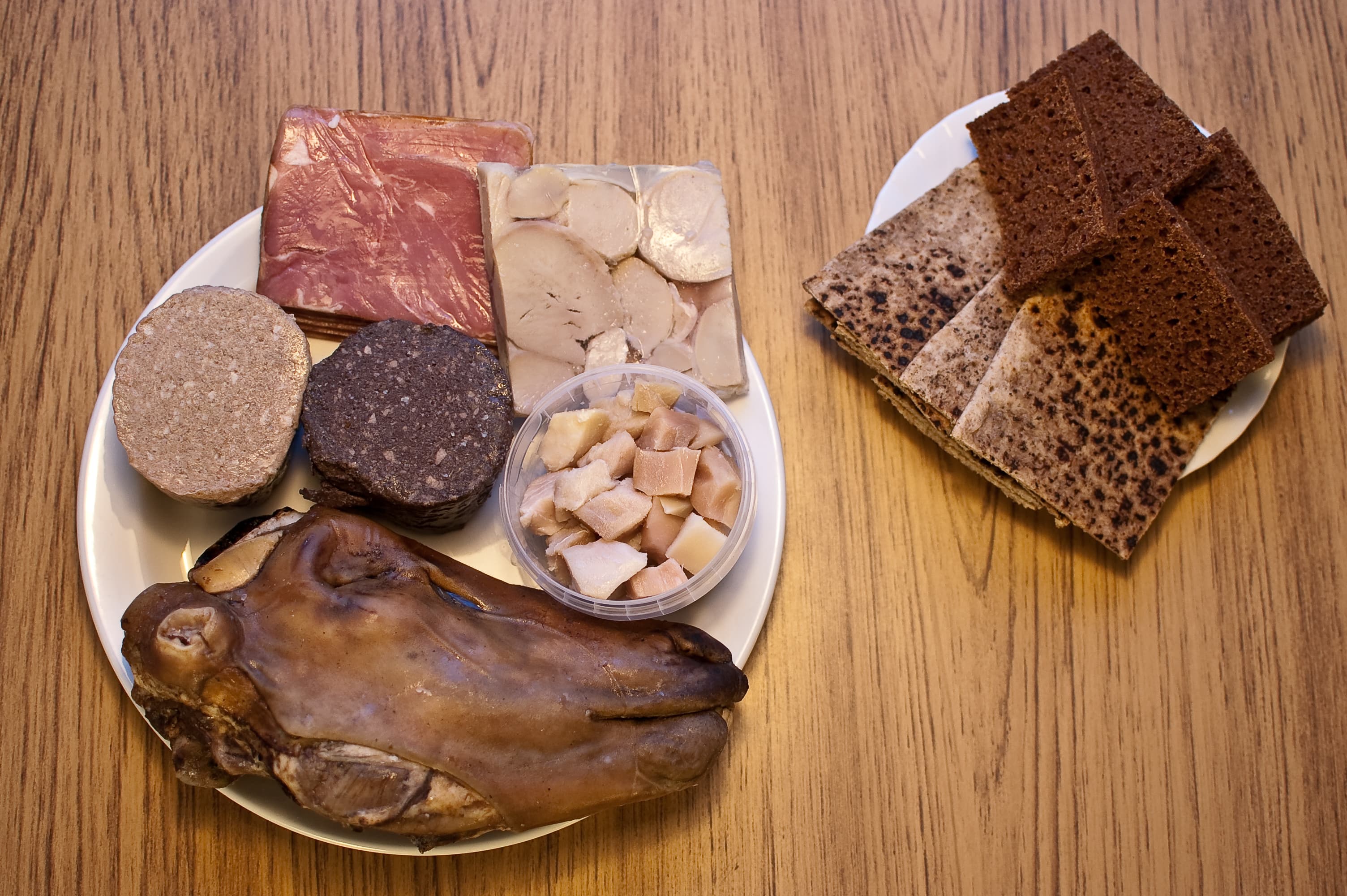 Þorramatur — a icelandic main course dish from Iceland — featuring preserved proteins, dark rye bread, winter seasonal