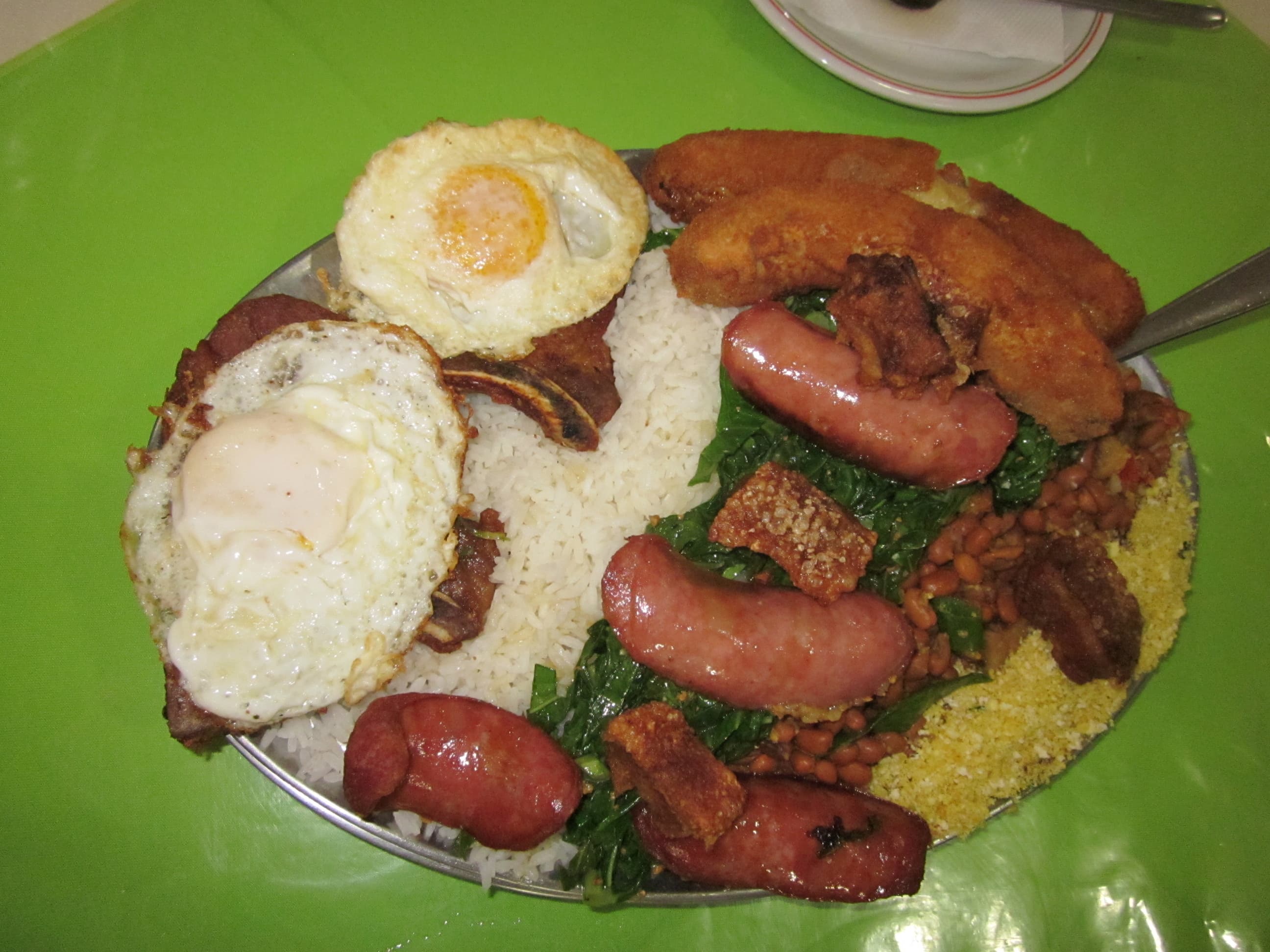 Virado — a brazilian main course dish from Brazil — featuring pork-forward, layered textures, fried-and-braised